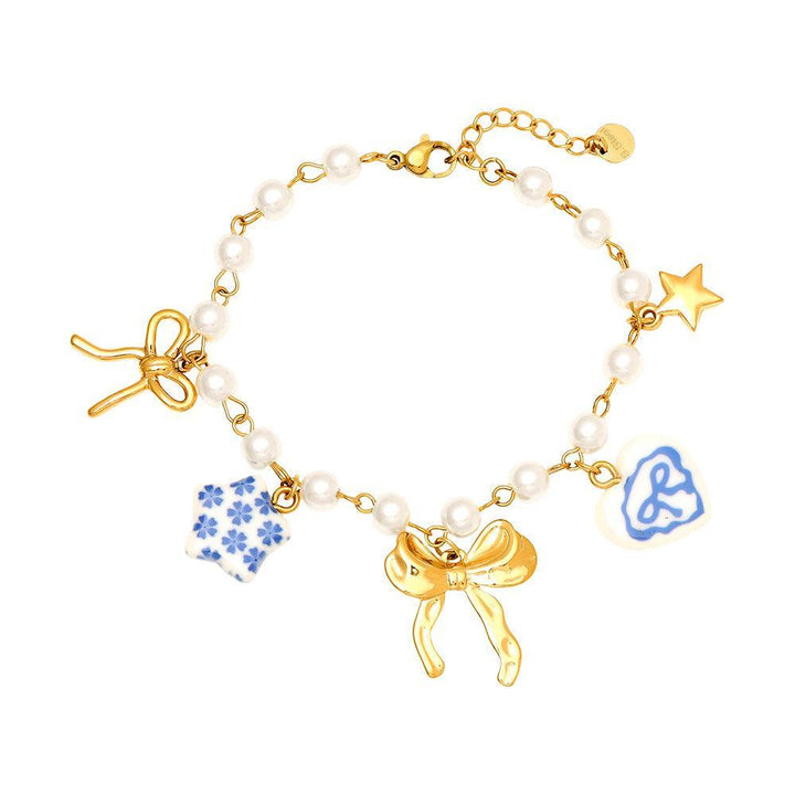 "Lioraé" – Stainless Steel Bracelet with Ceramic Beads & Fancy Charms, 18 cm + 4 cm
