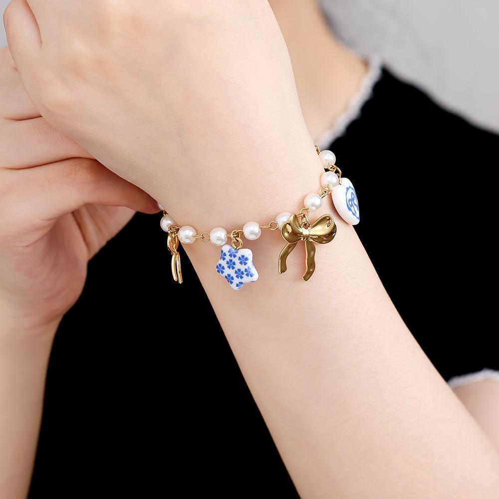 "Lioraé" – Stainless Steel Bracelet with Ceramic Beads & Fancy Charms, 18 cm + 4 cm
