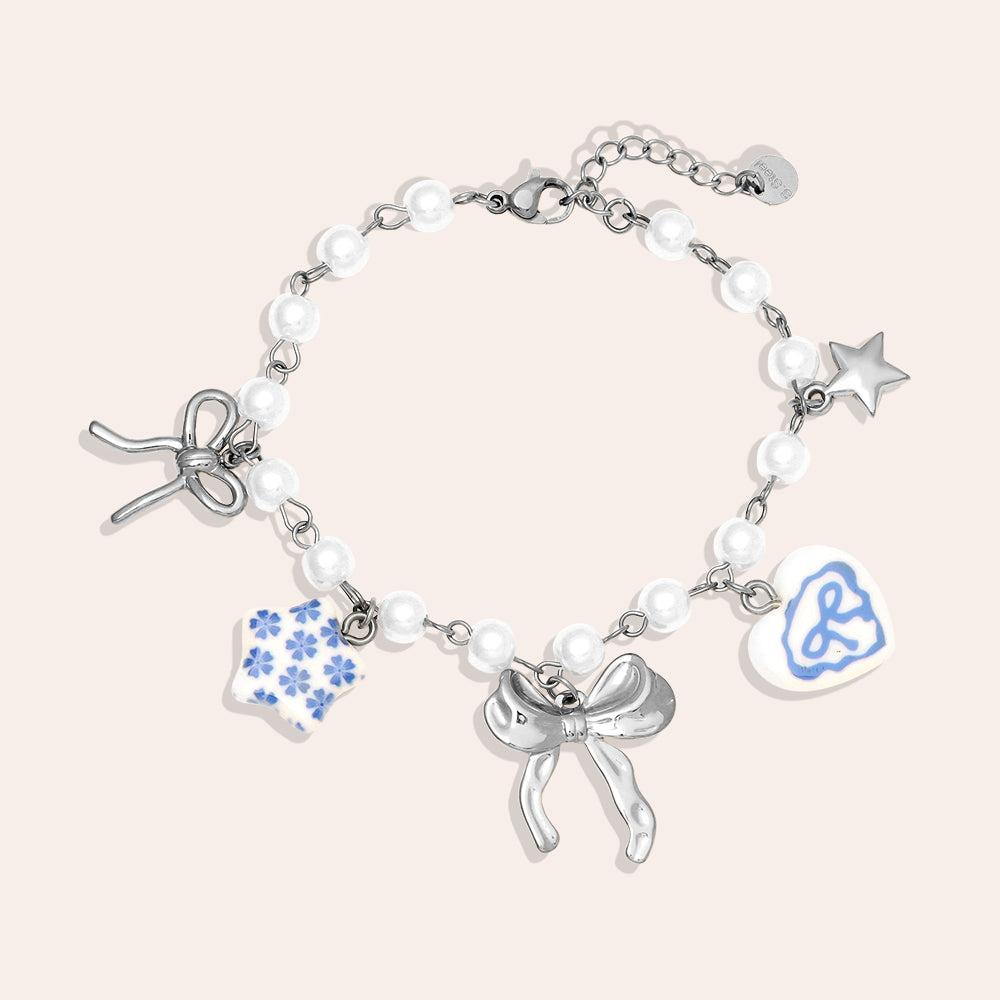 "Lioraé" – Stainless Steel Bracelet with Ceramic Beads & Fancy Charms, 18 cm + 4 cm
