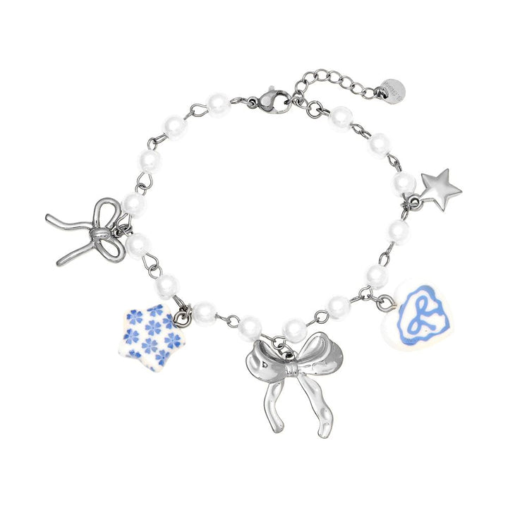 "Lioraé" – Stainless Steel Bracelet with Ceramic Beads & Fancy Charms, 18 cm + 4 cm