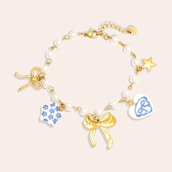 "Lioraé" – Stainless Steel Bracelet with Ceramic Beads & Fancy Charms, 18 cm + 4 cm