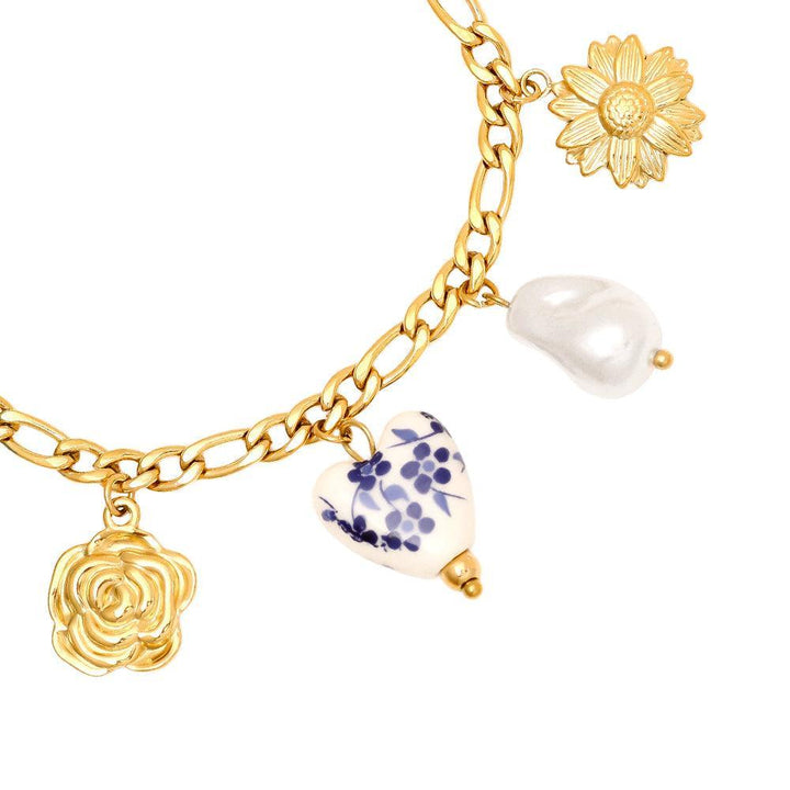 „Lunielle“ – Edelstahl-Arm­kette mit Keramikperlen-Charms, 17 cm + 3 cm