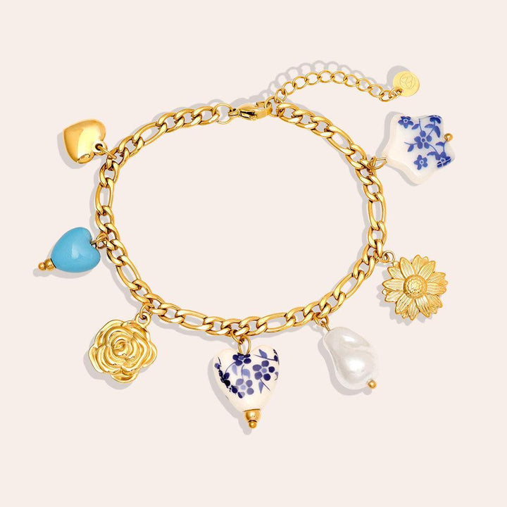 „Lunielle“ – Edelstahl-Arm­kette mit Keramikperlen-Charms, 17 cm + 3 cm