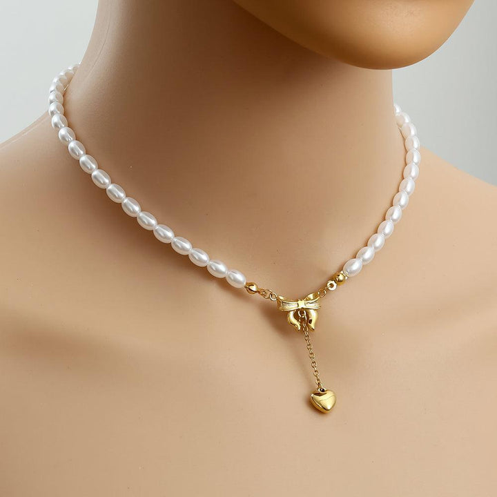 "Norariaine" Bowtie With Heart In Pearl Chain Stainless Steel Necklace