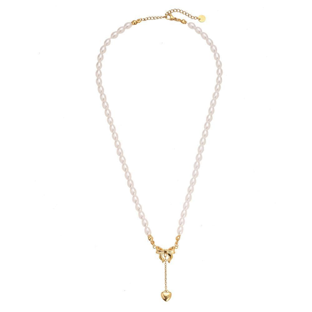 "Norariaine" Bowtie With Heart In Pearl Chain Stainless Steel Necklace