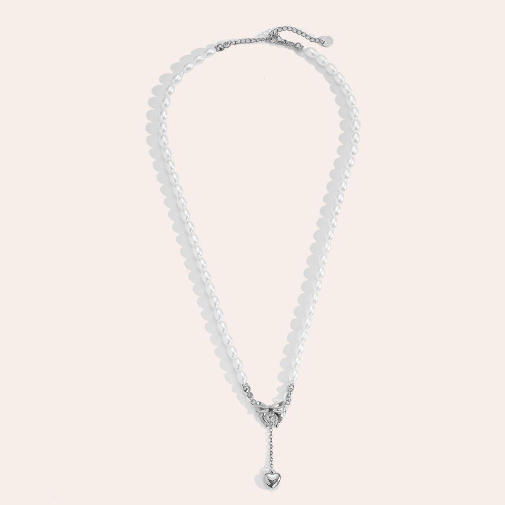 "Norariaine" Bowtie With Heart In Pearl Chain Stainless Steel Necklace