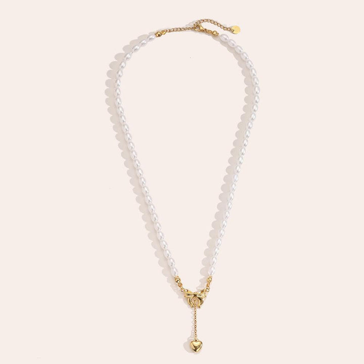 "Norariaine" Bowtie With Heart In Pearl Chain Stainless Steel Necklace